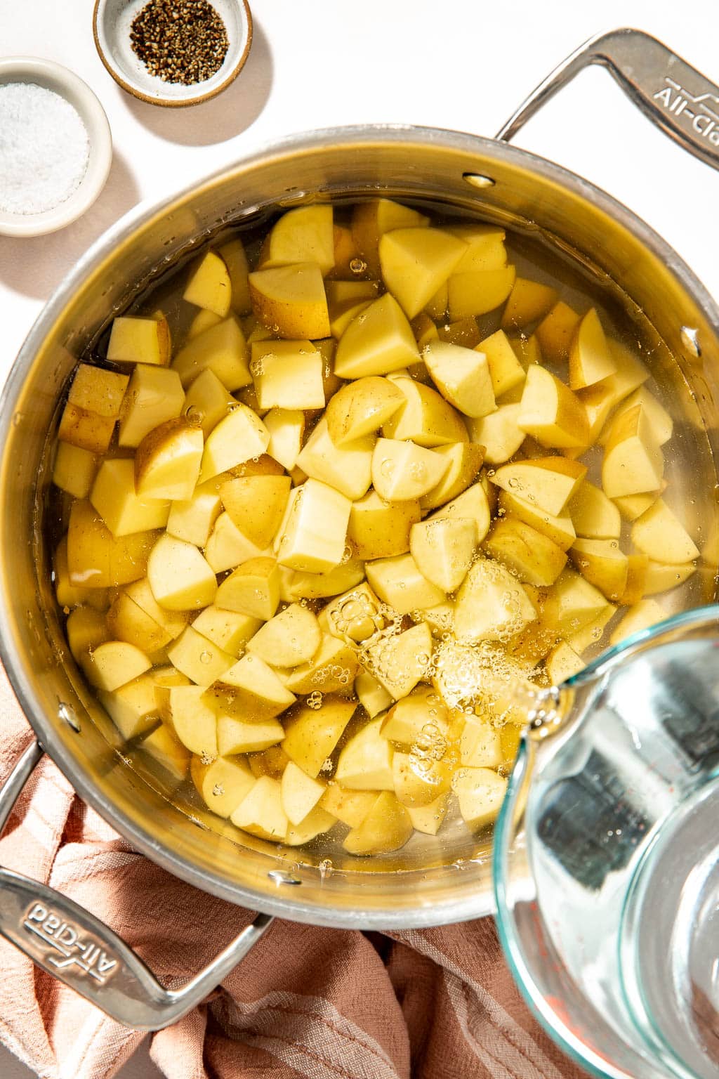 Yukon gold potatoes in a pot with water before boiling