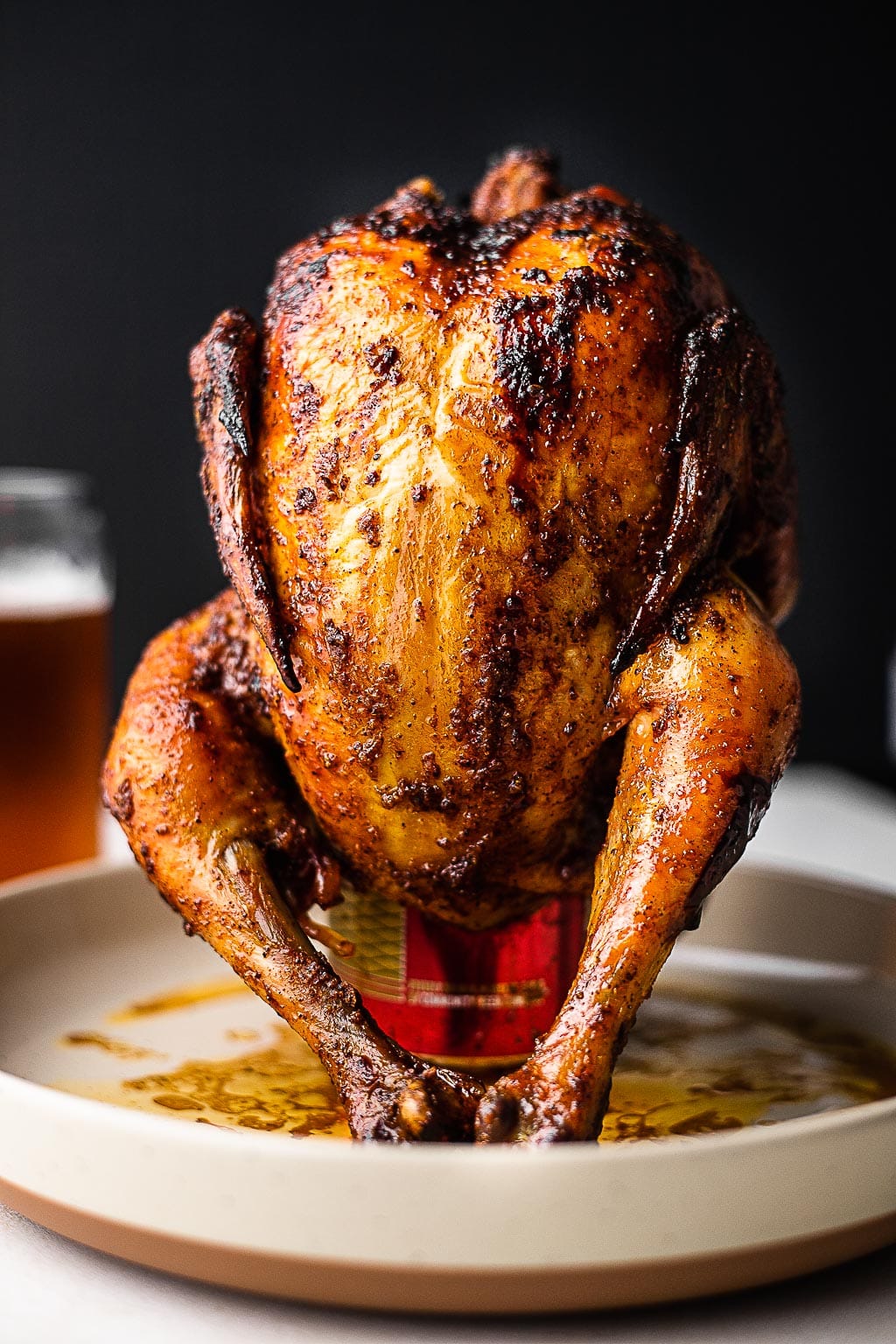 A whole chicken on a beer can