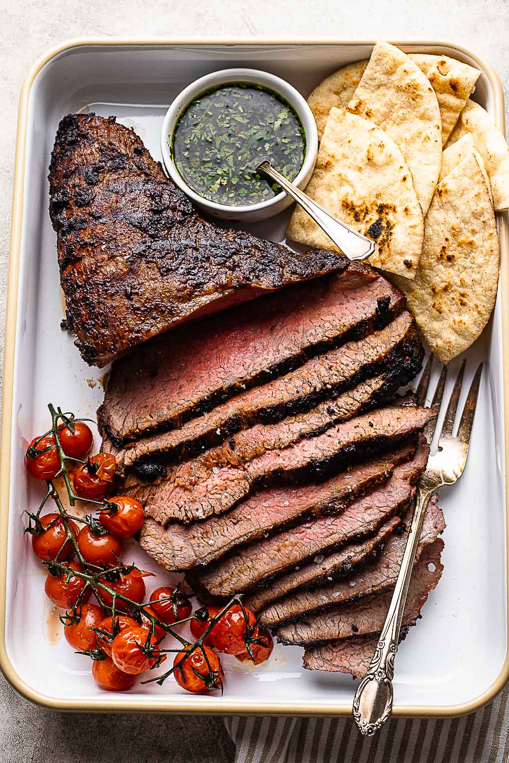 grilled tri-tip, sliced on a platter 