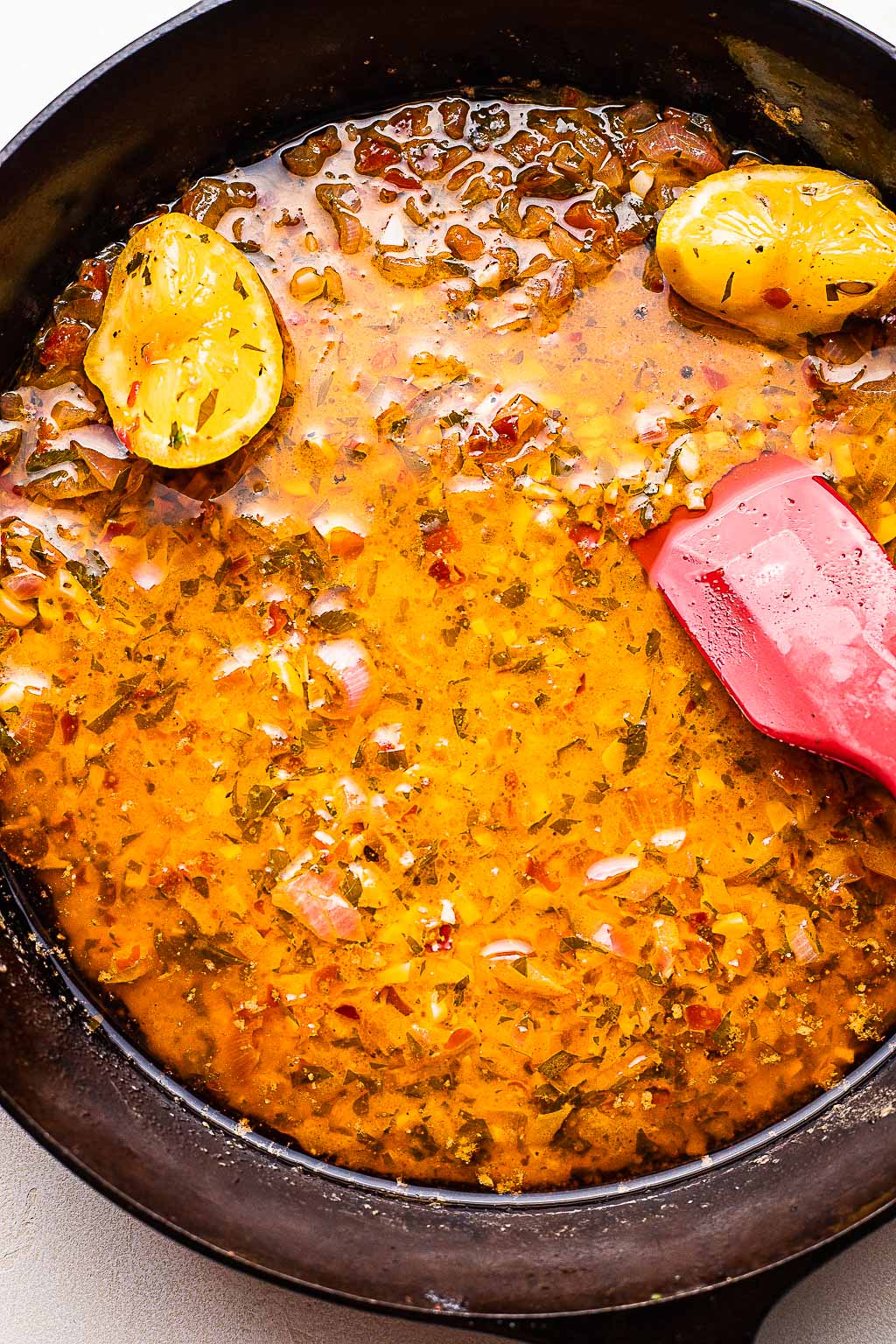 Spicy butter sauce in a cast iron skillet 