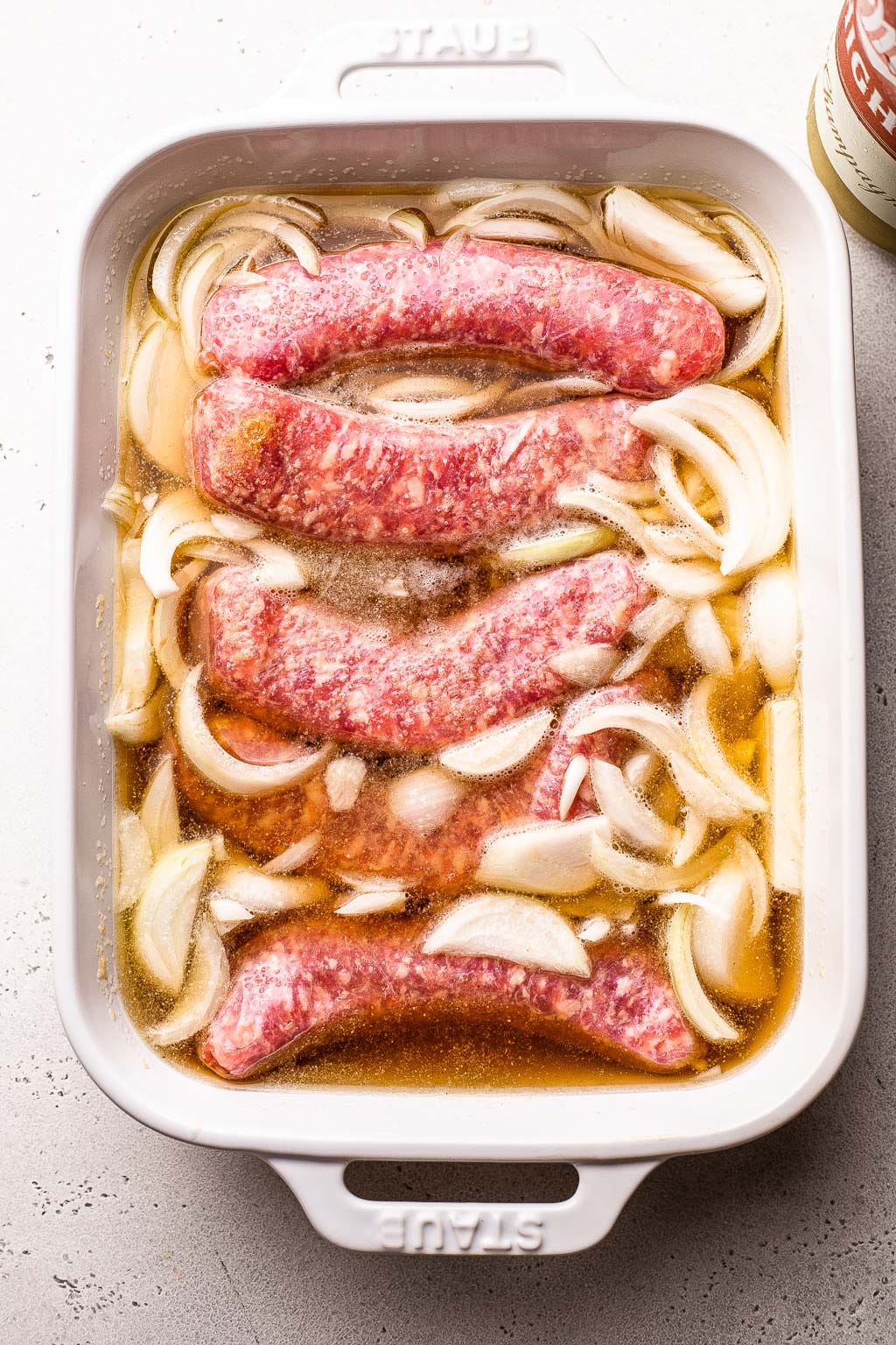 Marinating brats and onions in beer 