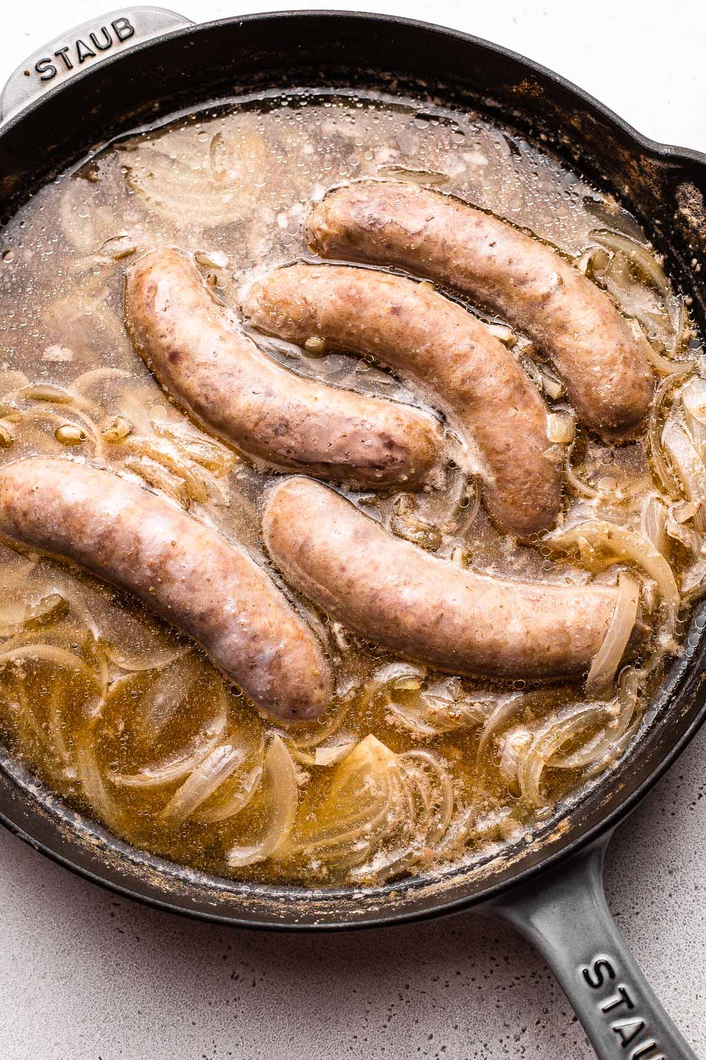 brats simmering in beer 