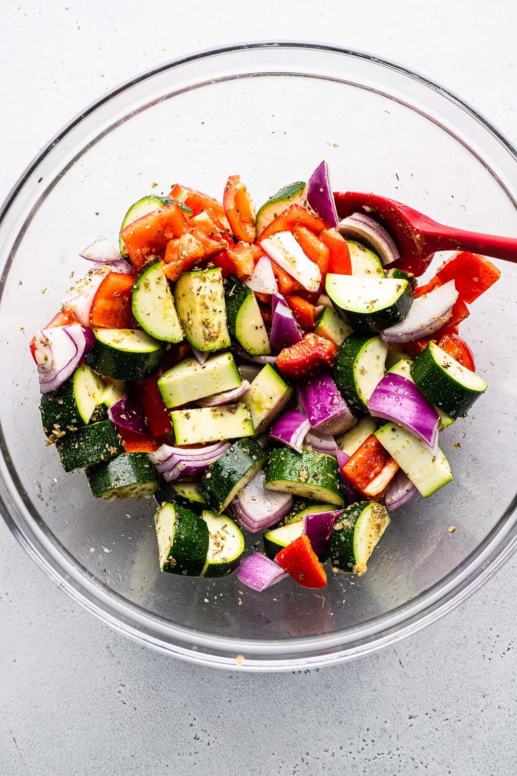 Summer vegetables chopped and tossed in oil 