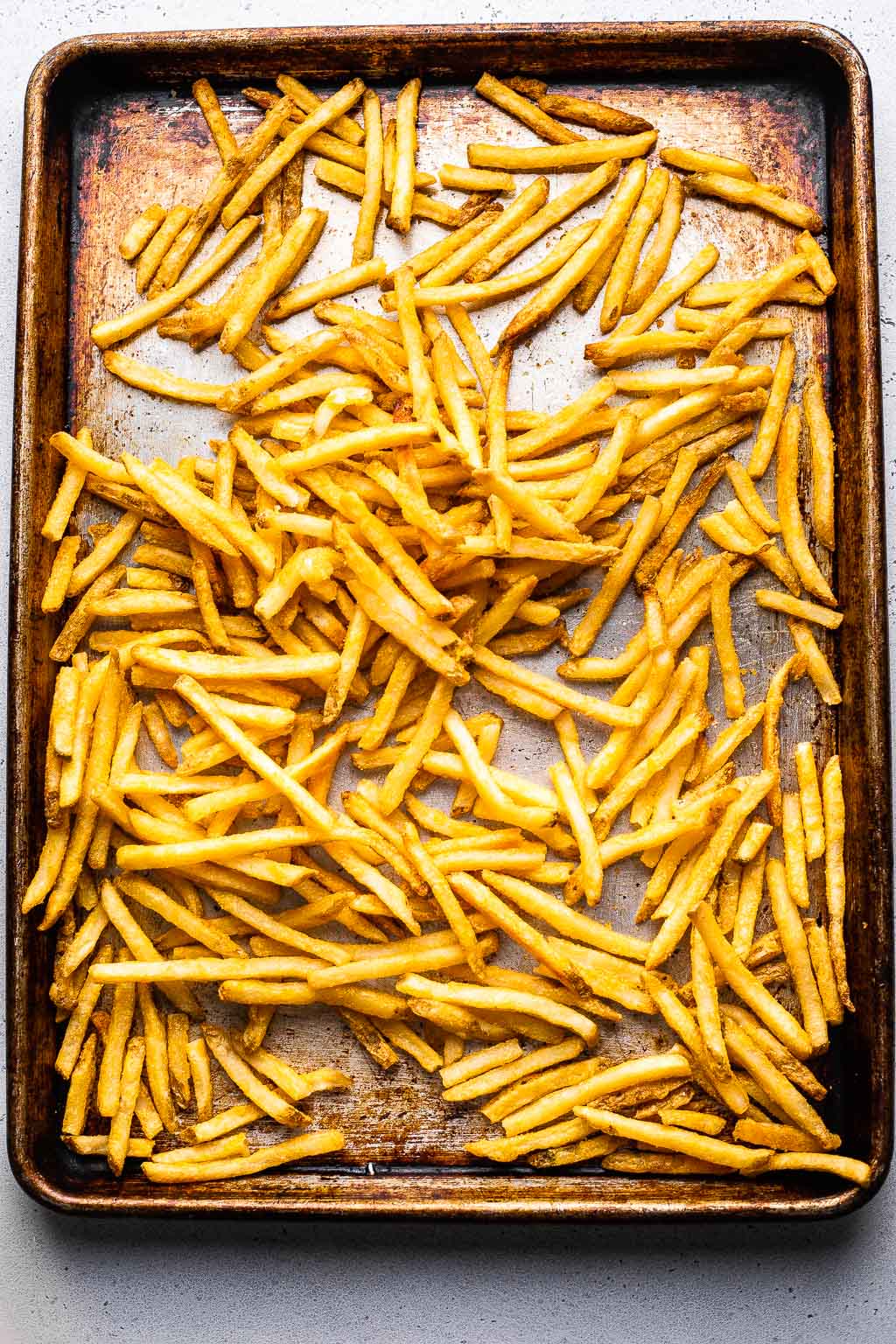 Crispy french fries on a sheet pan