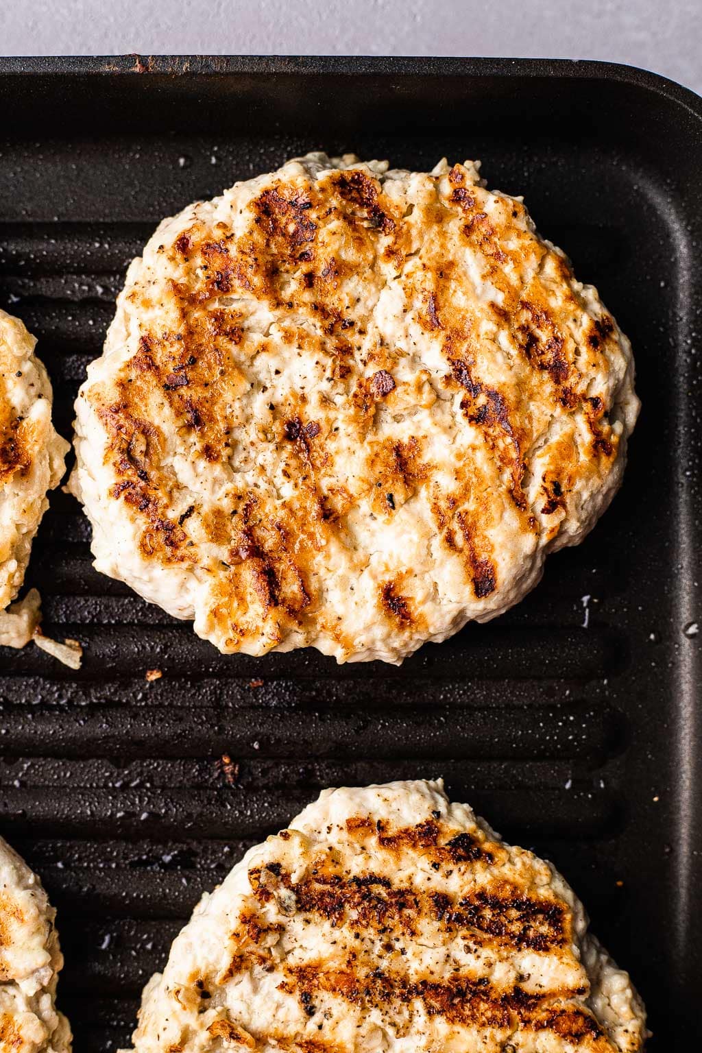 Chicken patties on a grill pan 