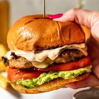 Spicy southwest turkey burgers in hand