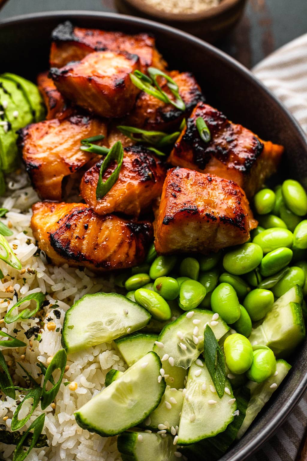 Close up of salmon over rice 