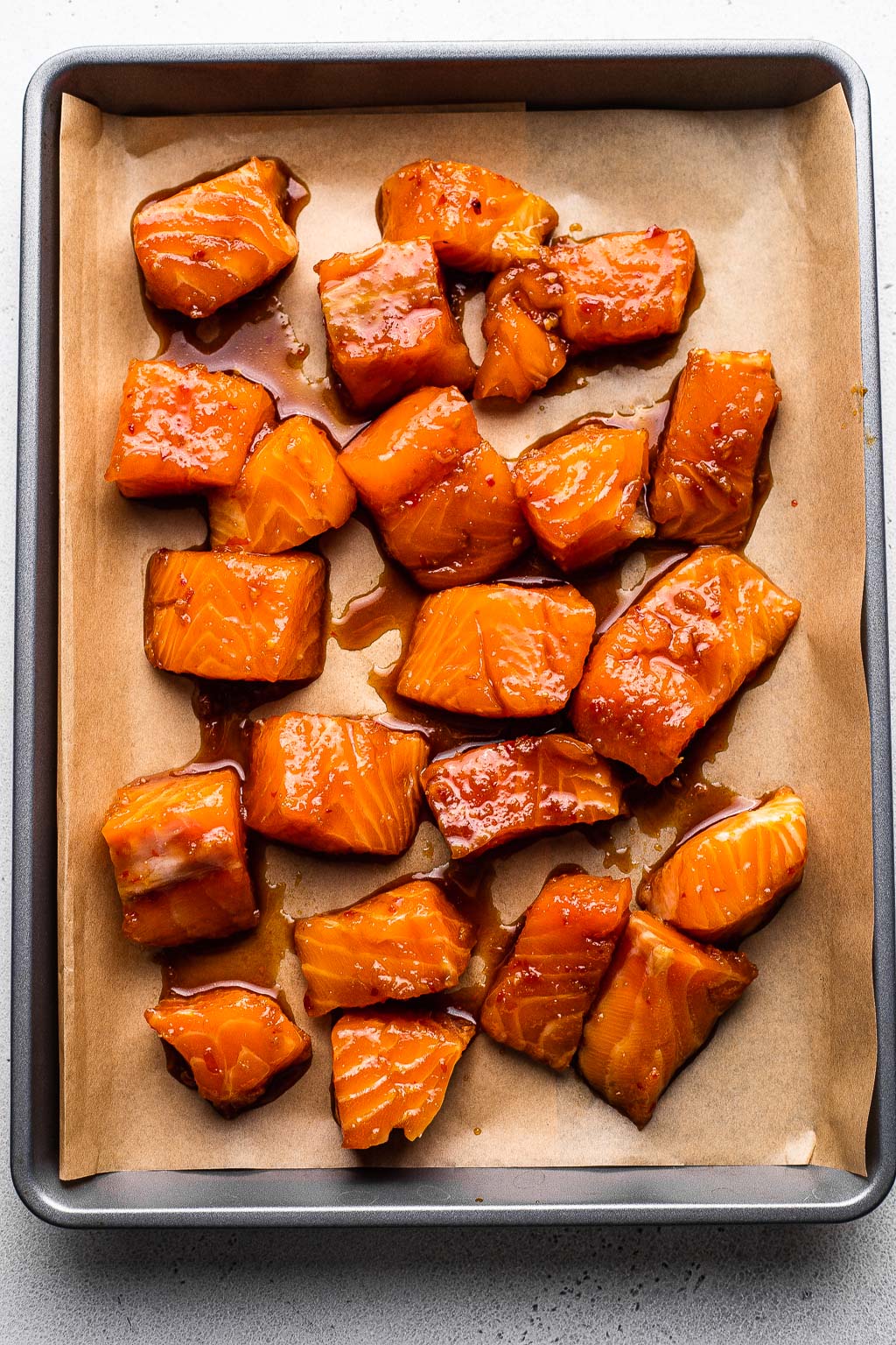 Marinated salmon cubes ready to be baked 