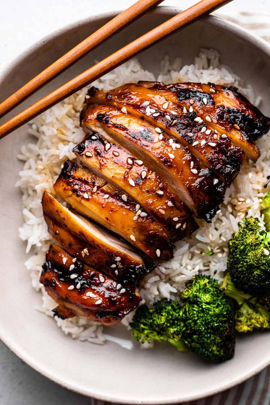 Grilled teriyaki chicken over rice, with broccoli 