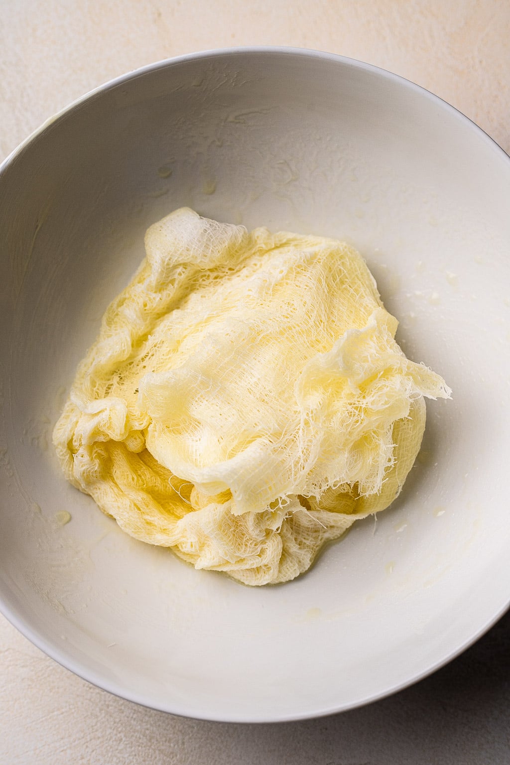 A cheesecloth soaked in butter 