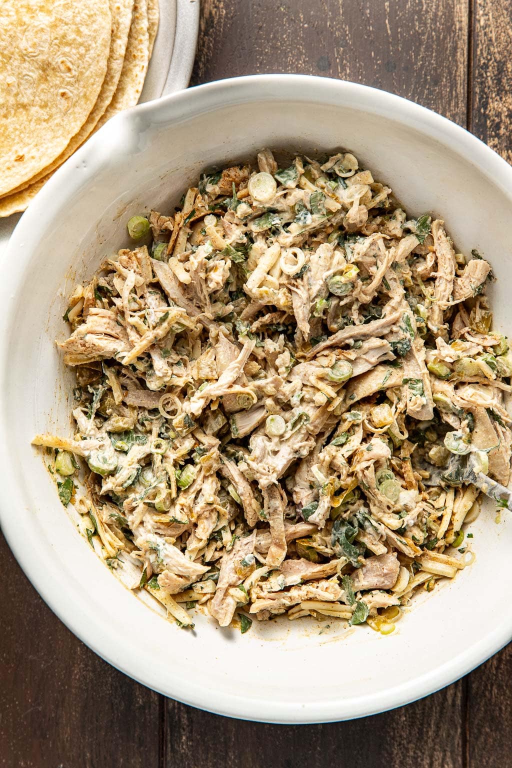 turkey enchilada filling in a mixing bowl