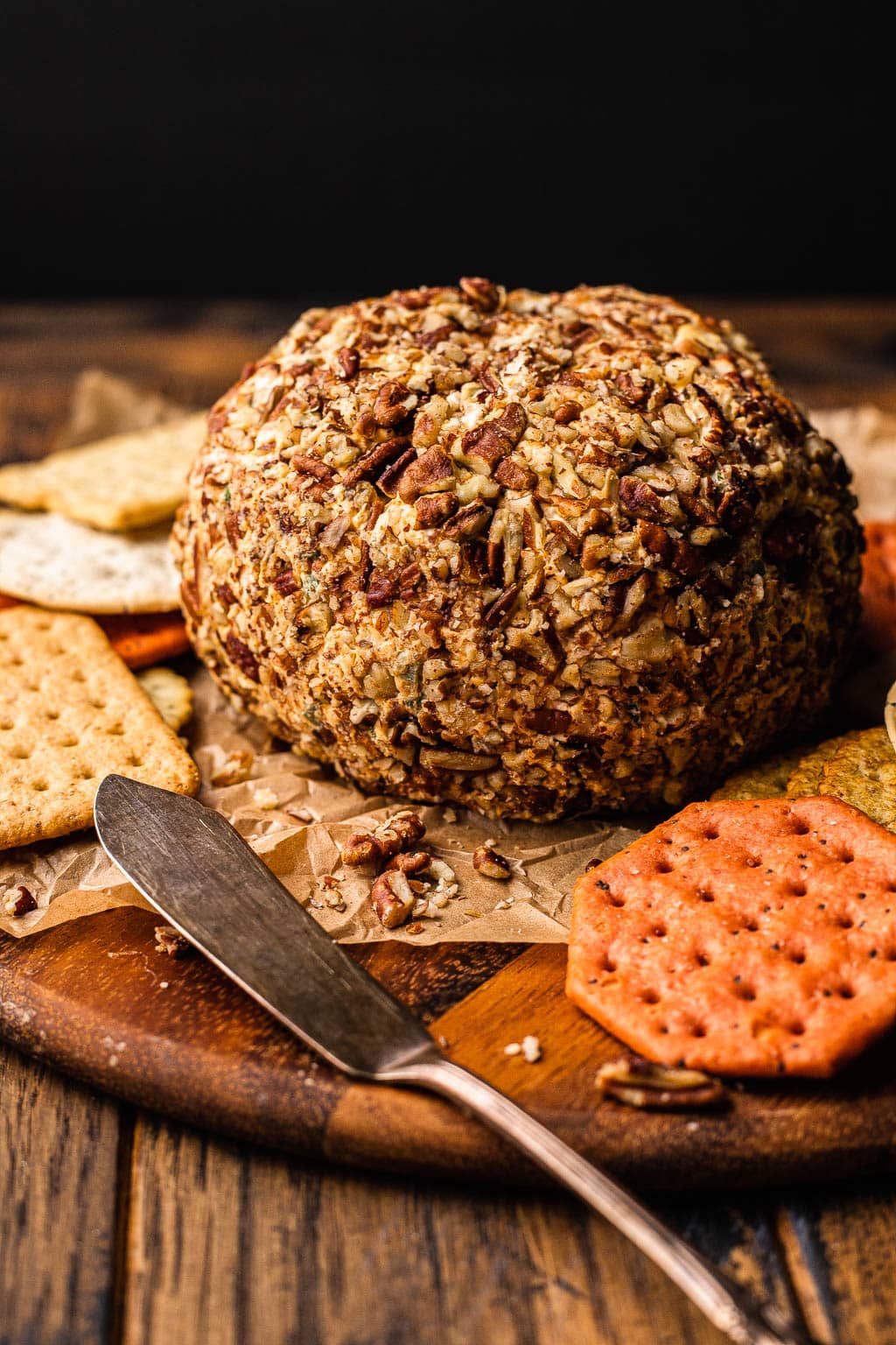 A Kaukauna cheddar cheese ball coated in pecans