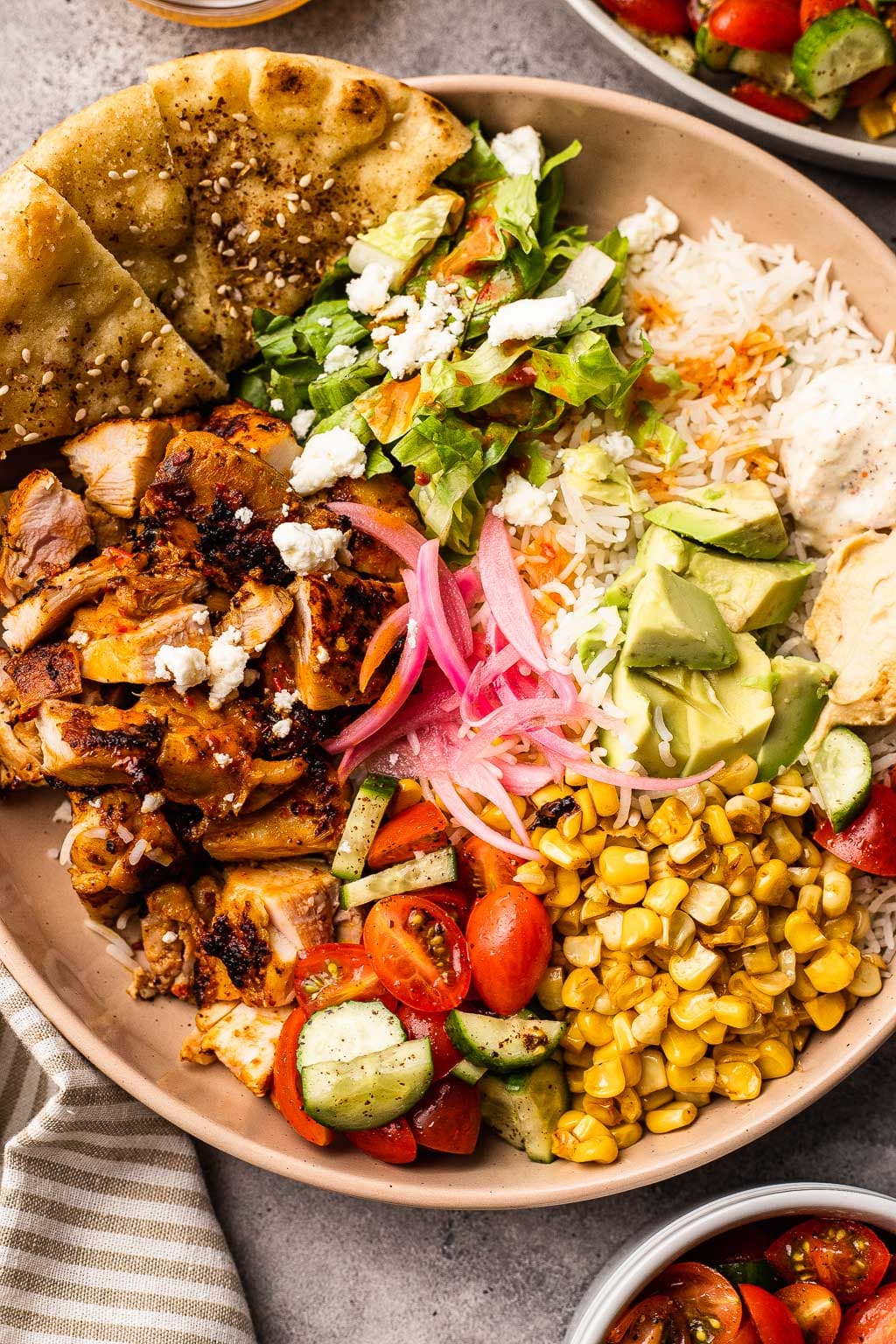 harissa chicken bowl, with lots of toppings 