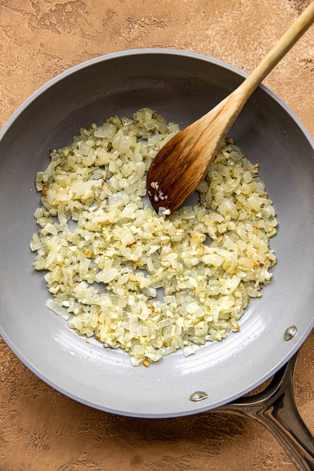 Sauteed garlic and onions in a skillet 