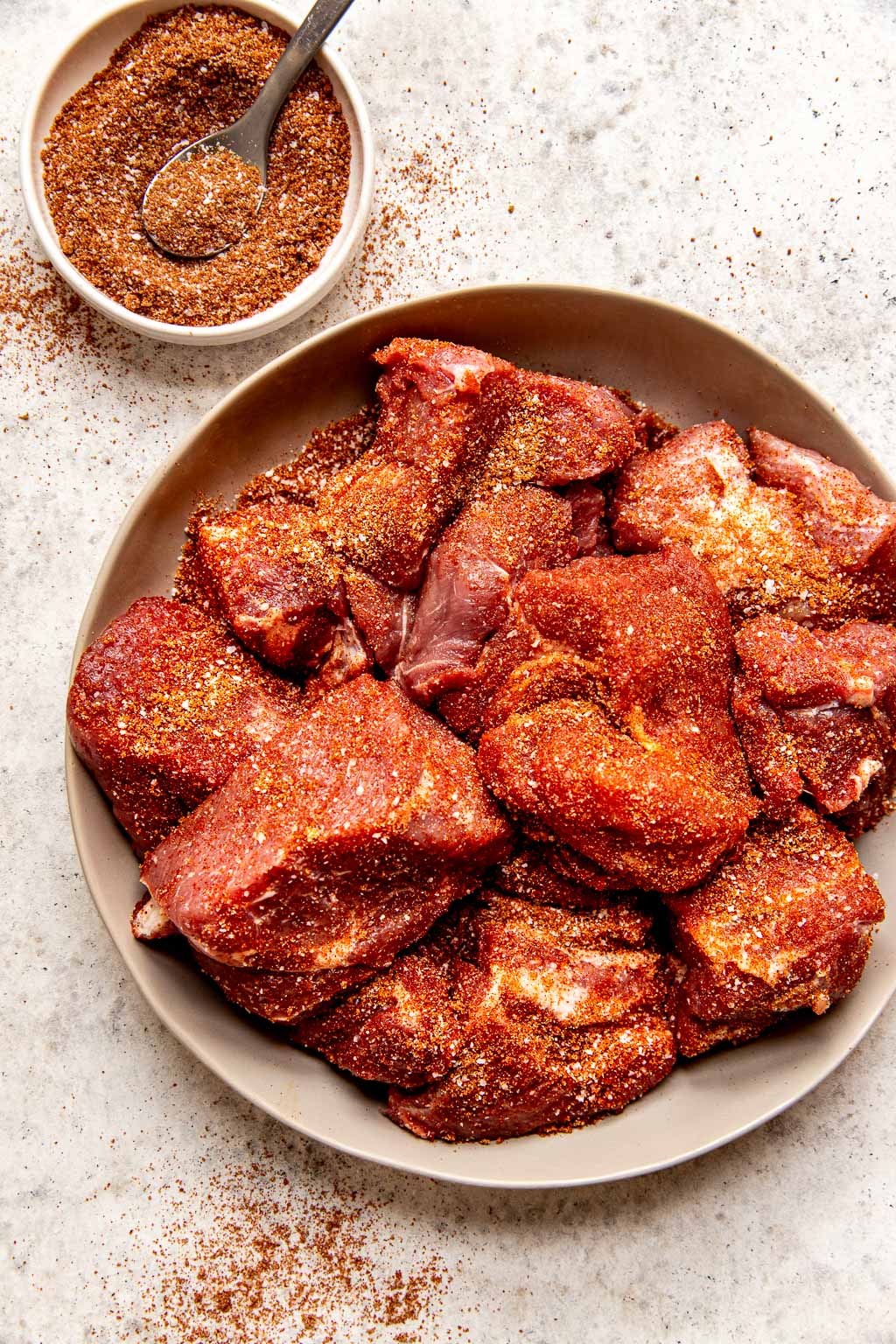 Pork butt coated in bbq dry rub