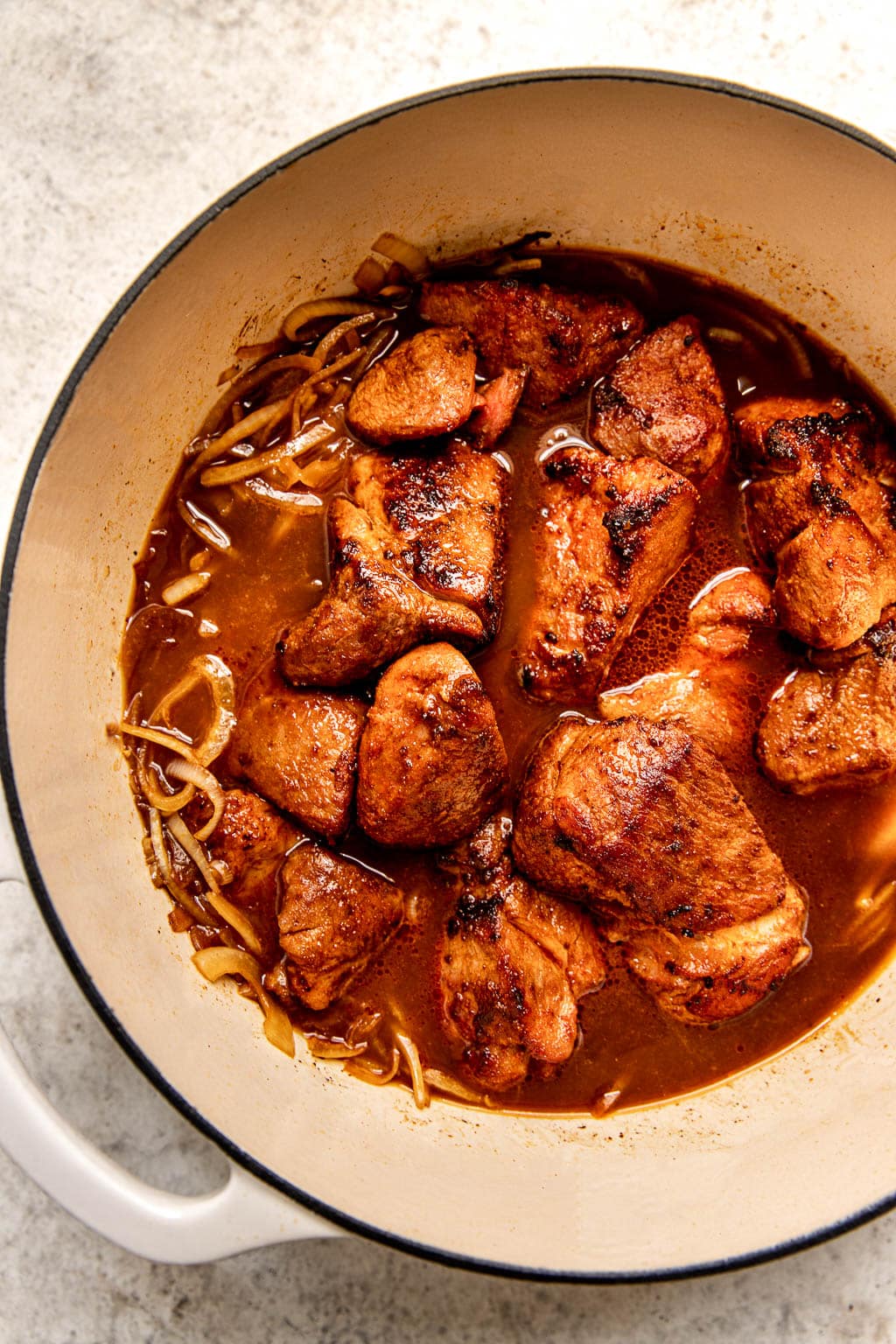 Pork prepped for braising in dutch oven