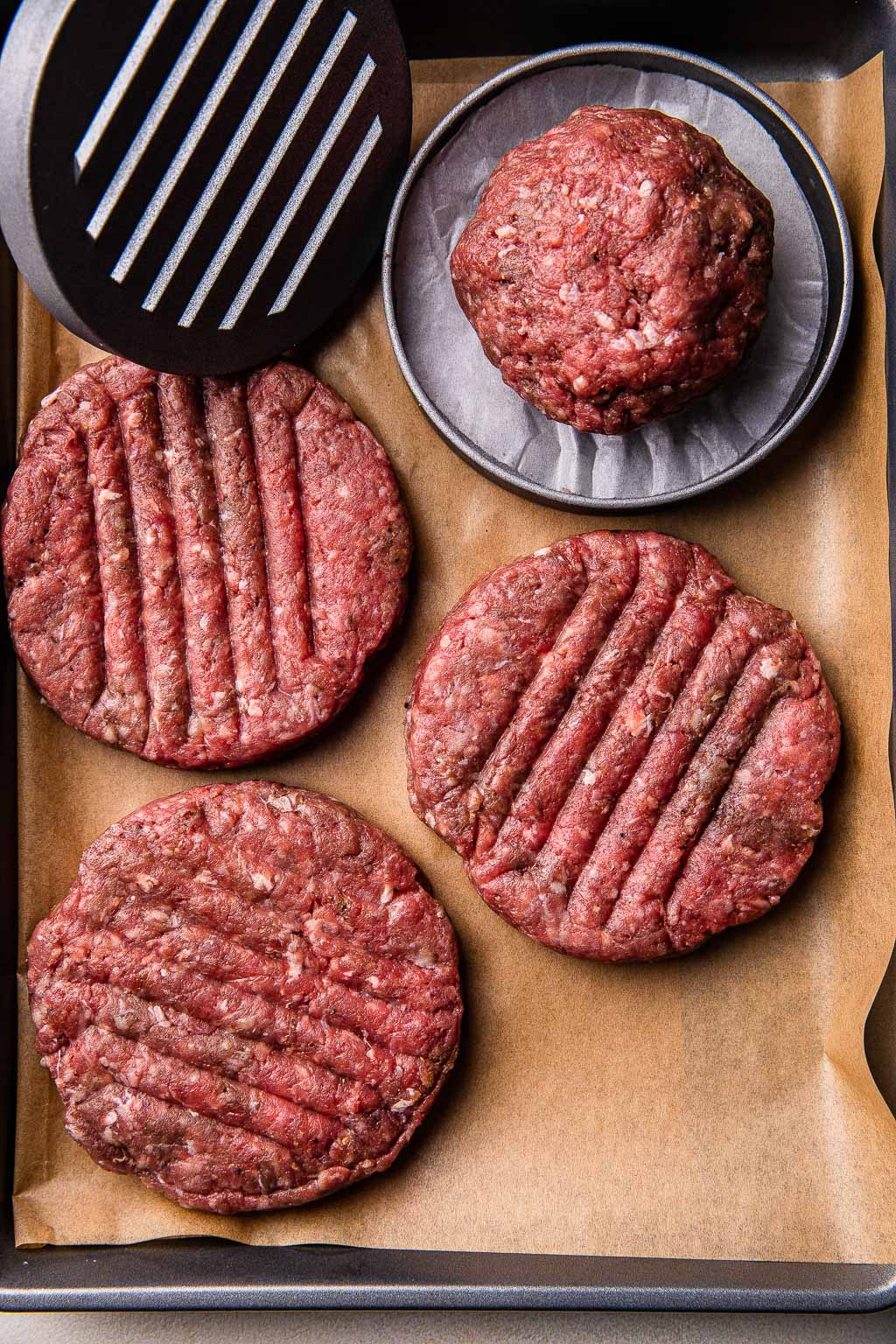 Burger mixture being shaped with a burger mold