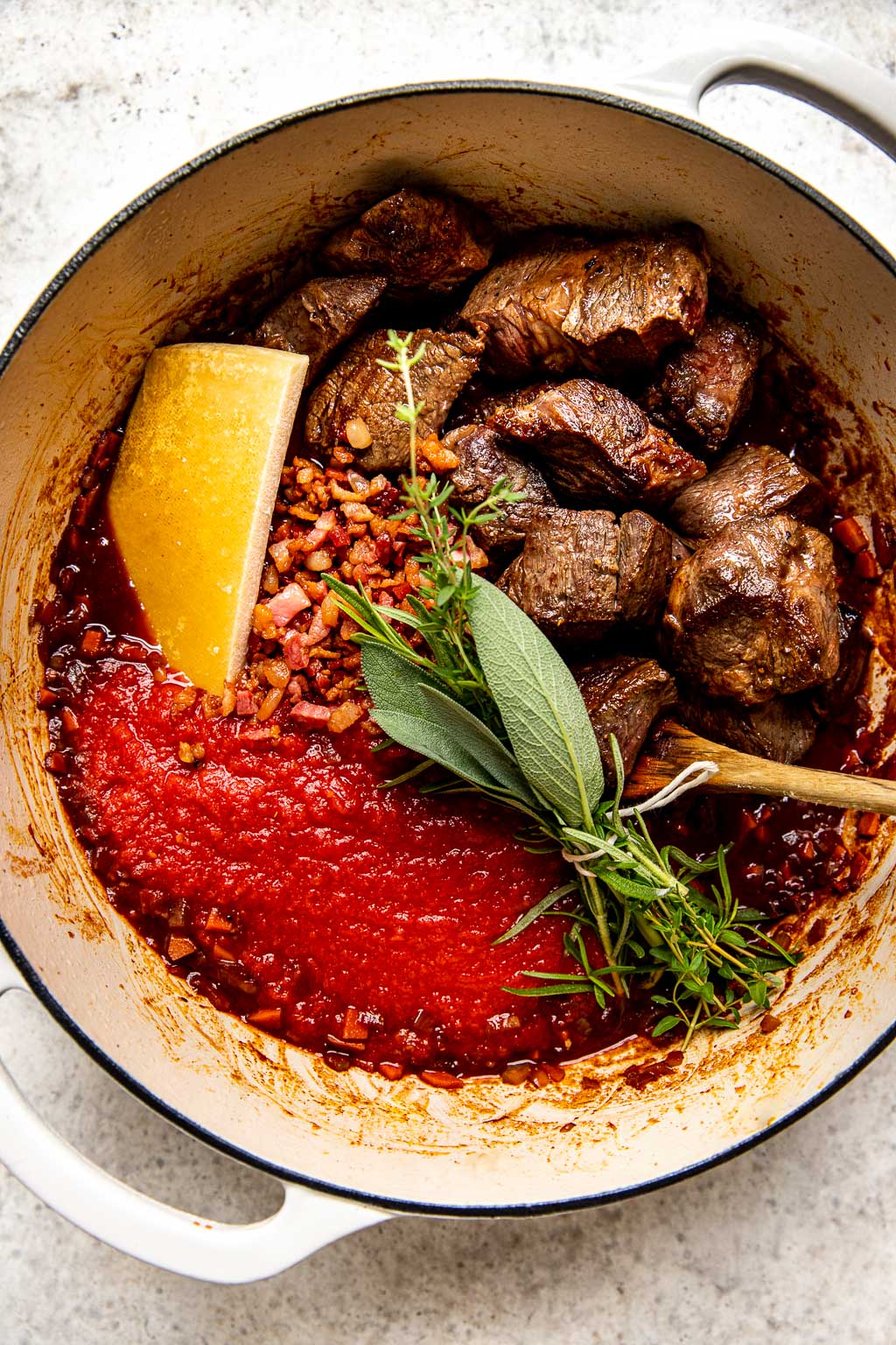 Ragu ingredients in a Dutch oven