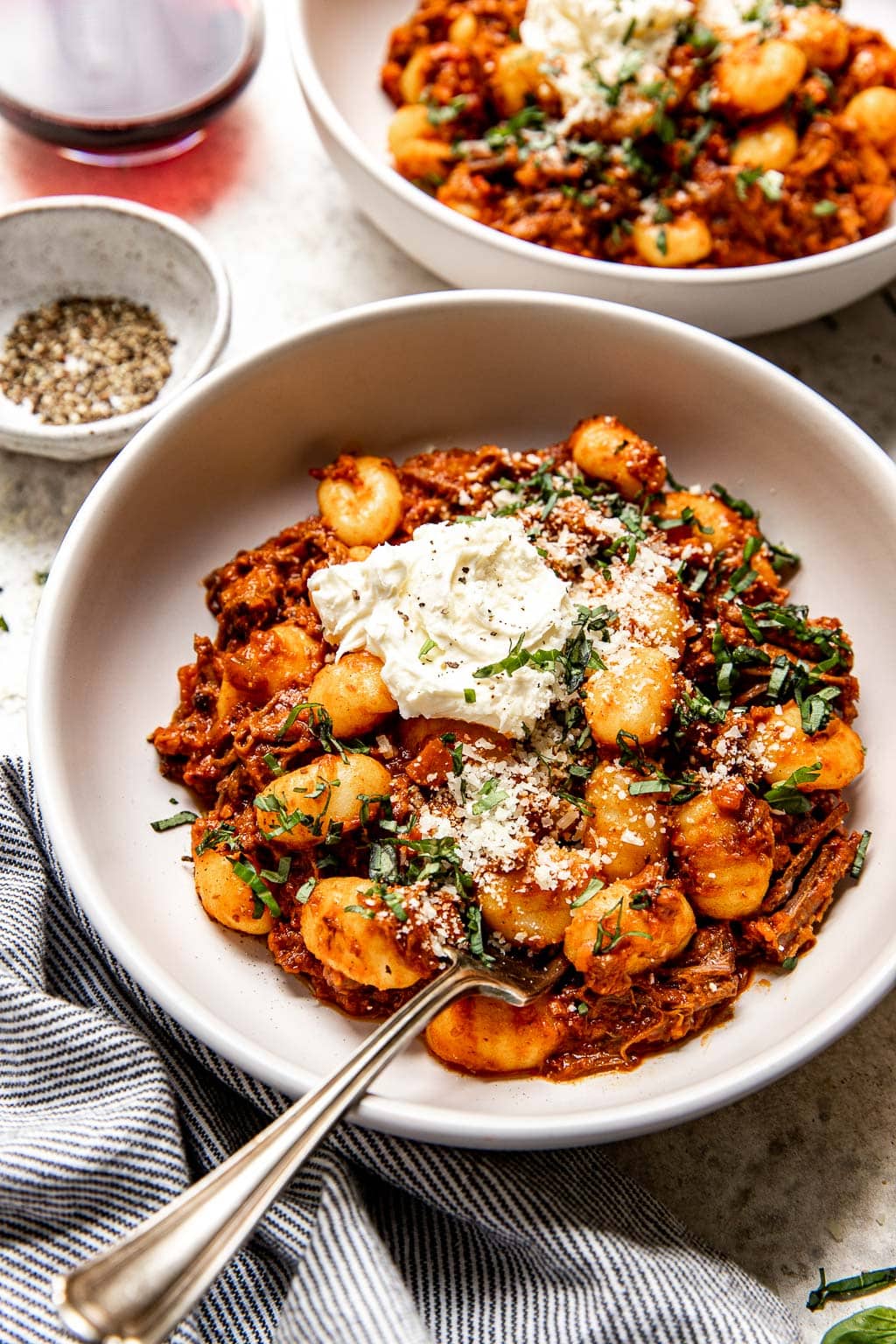 braised beef ragu served over gnocchi with a dollop of mascarpone 