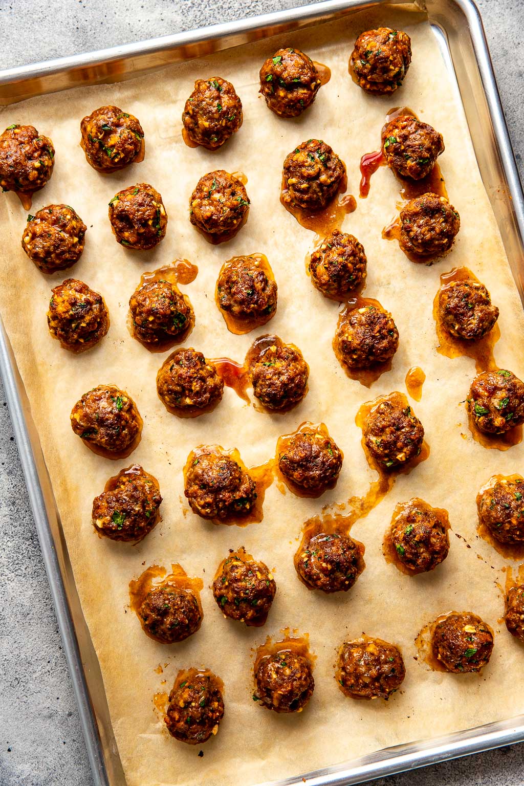 Baked meatballs on a baking sheet 