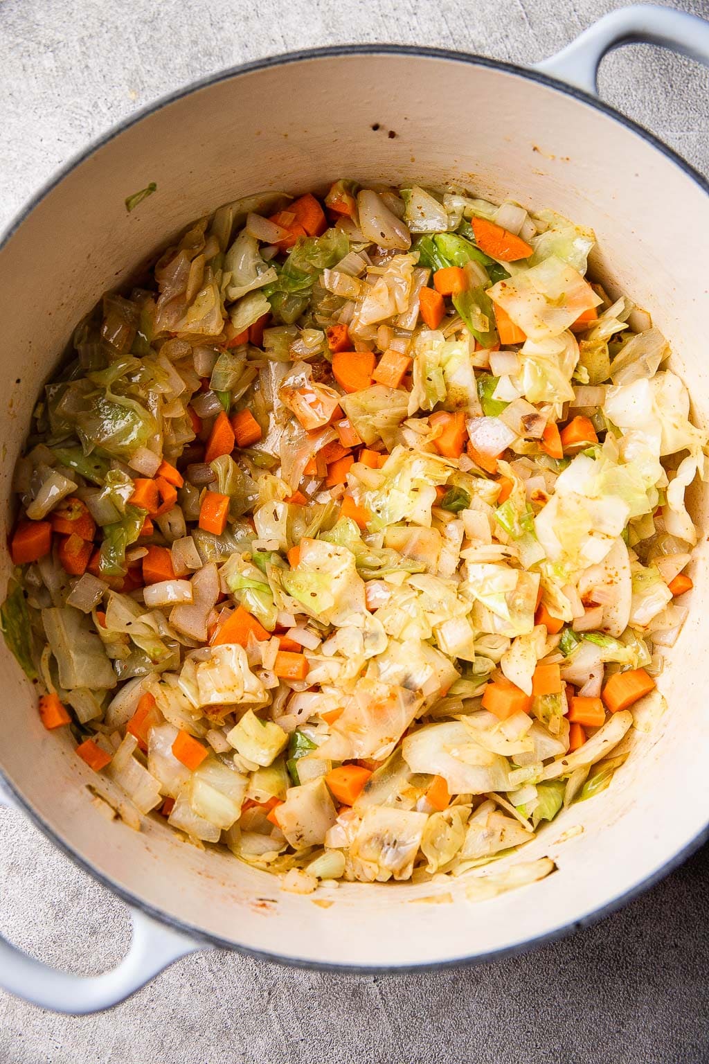 Cooked cabbage and vegetables in Dutch oven