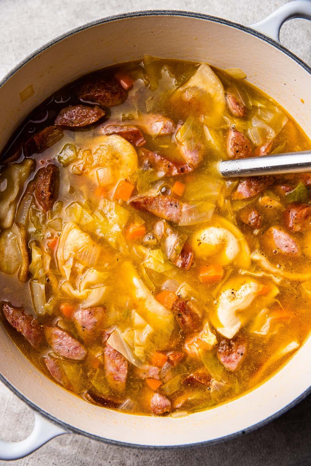 Kielbasa and pierogi soup in Dutch oven
