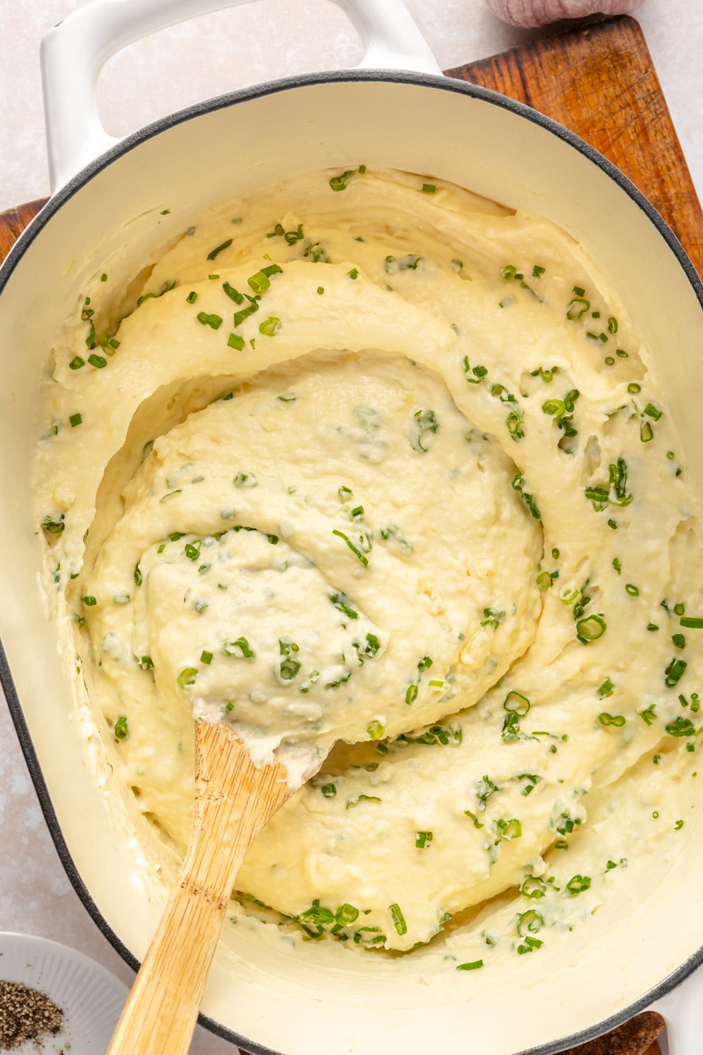 A dutch oven full of sour cream and onion mashed potatoes 