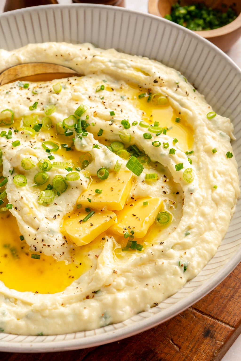 Mashed potatoes with butter, sour cream, and onions 
