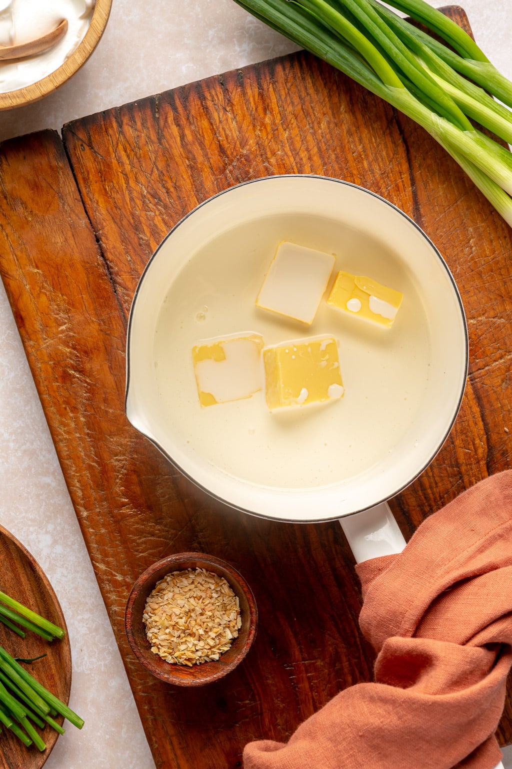 Cream and butter being warmed in a saucepan 