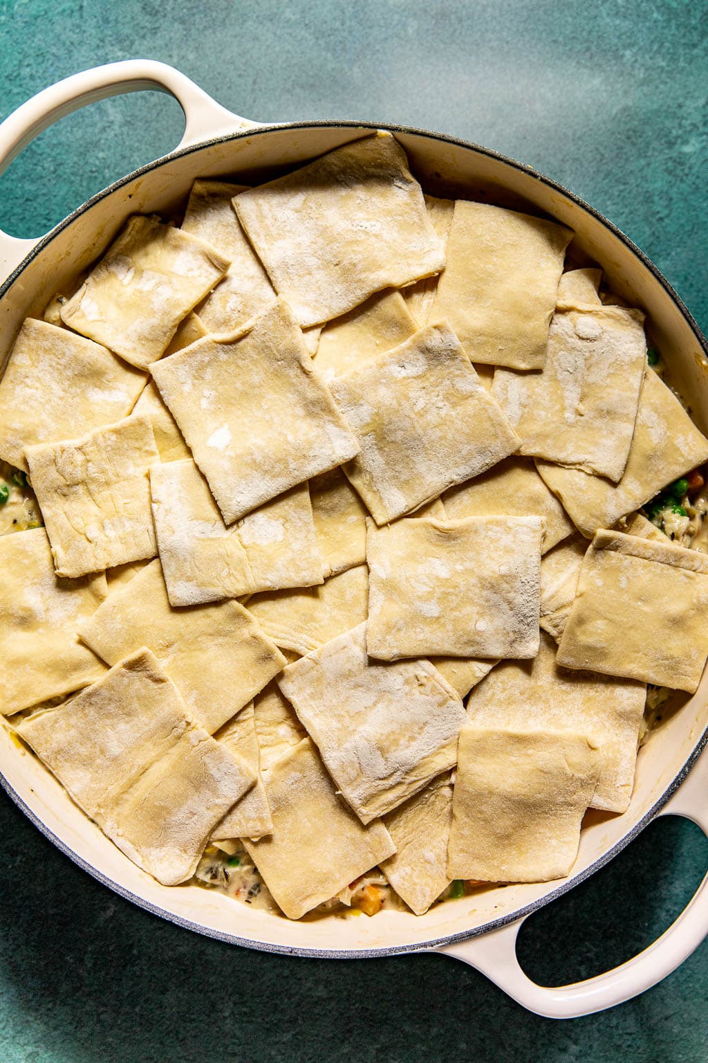 Puff pastry squares over chicken pot pie filling 