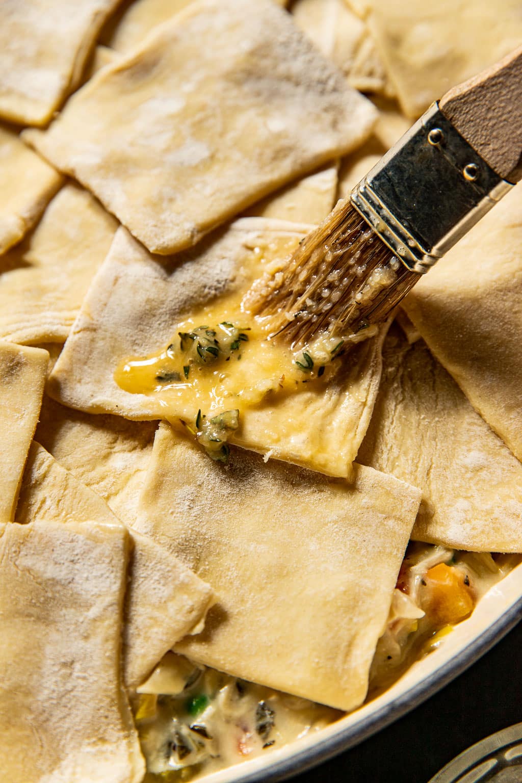 Brushing puff pastry with egg wash 