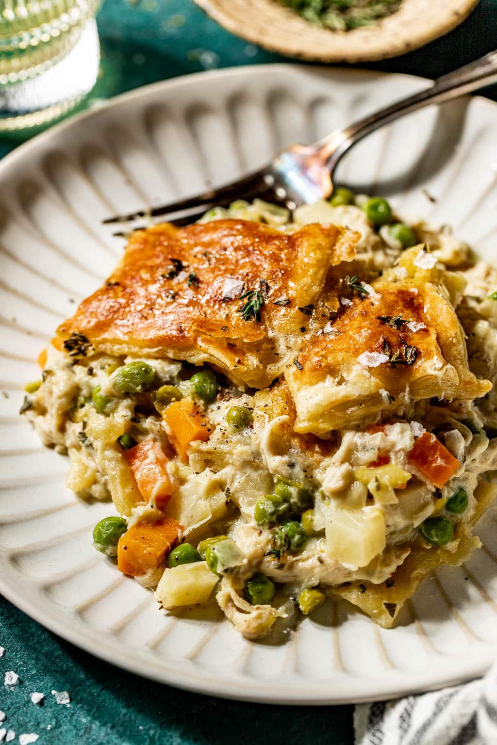 a serving of skillet chicken pot pie on a plate 