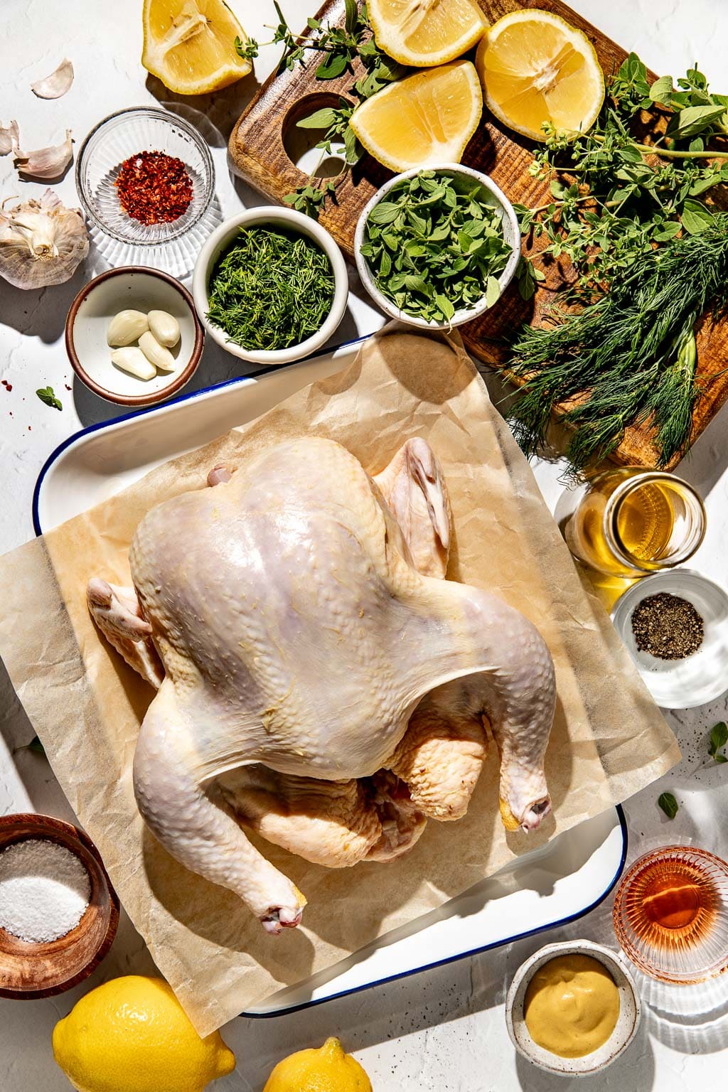 spatchcocked grilled lemon chicken ingredients laid out