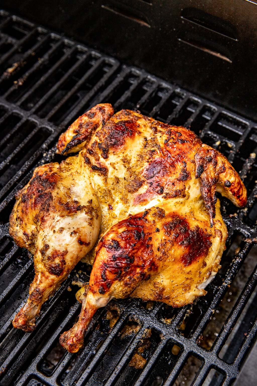 chicken on the grill, with browned skin