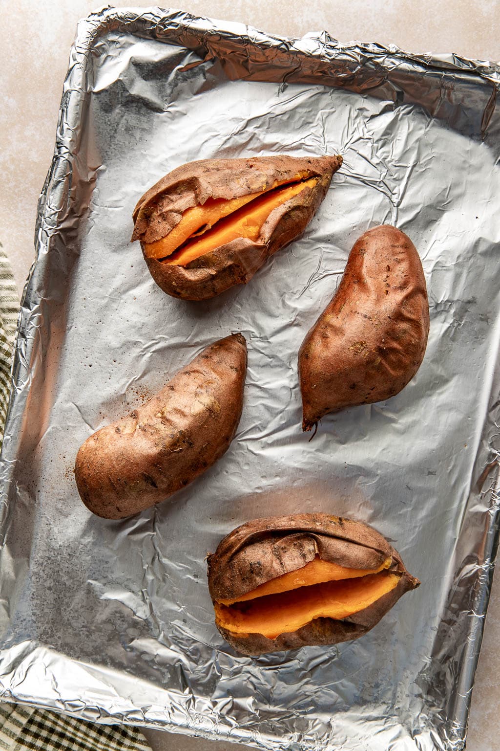 Roasted sweet potatoes on baking sheet. 