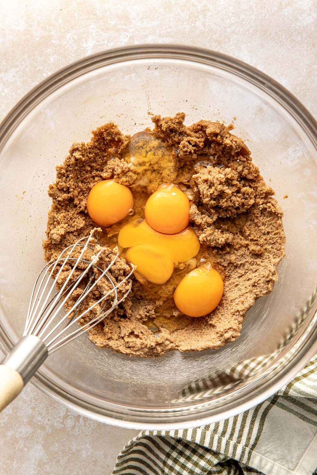 Sweet potato pie filling ingredients in a mixing bowl. 