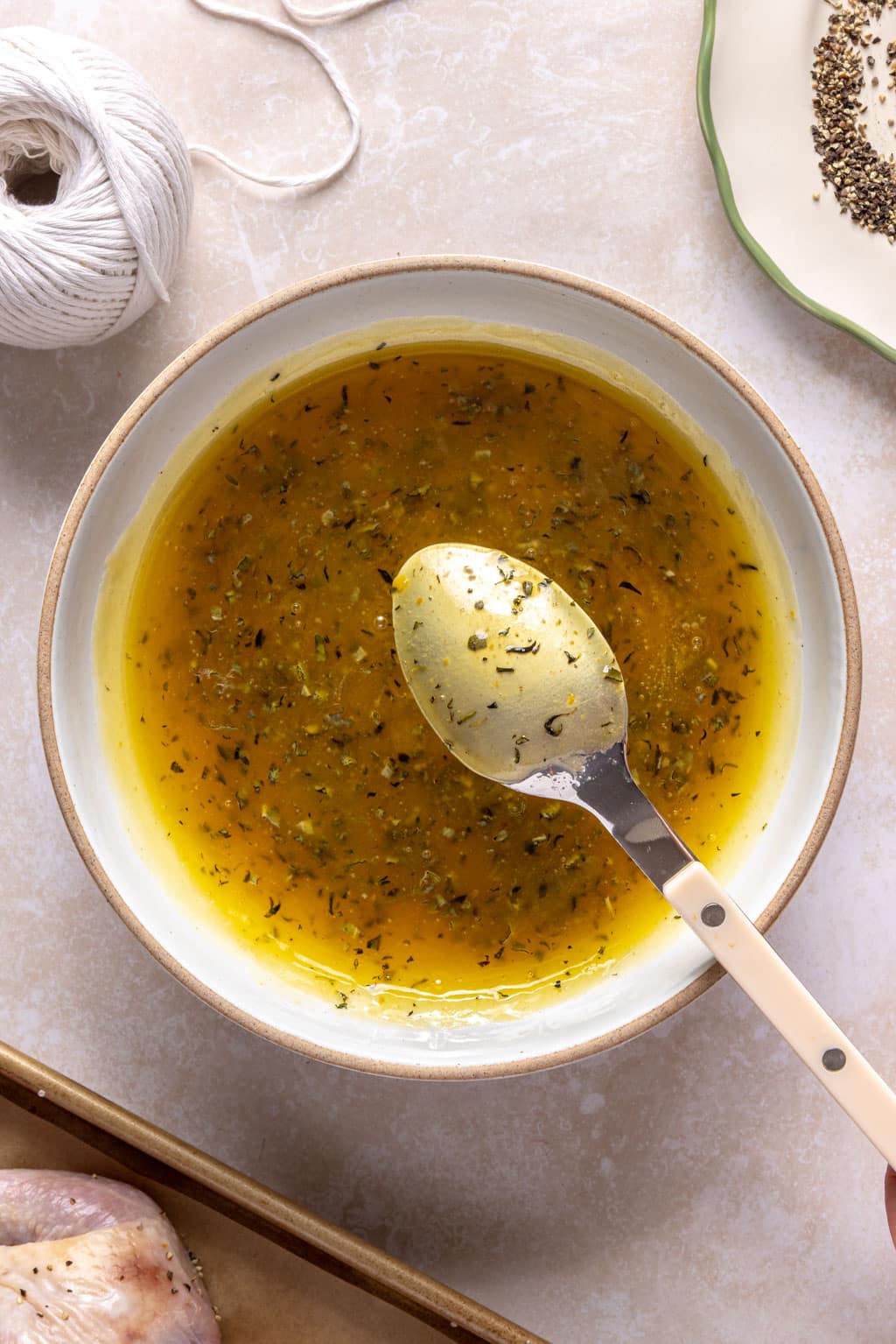 Maple herb Cornish hen glaze in a saucepan. 