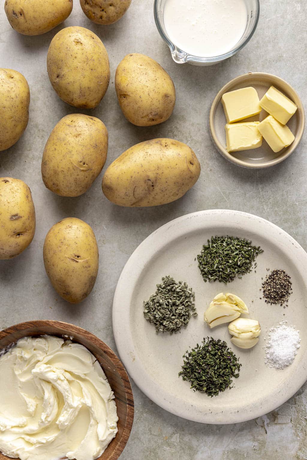 Ingredients for making mashed potatoes with mascarpone cheese. 
