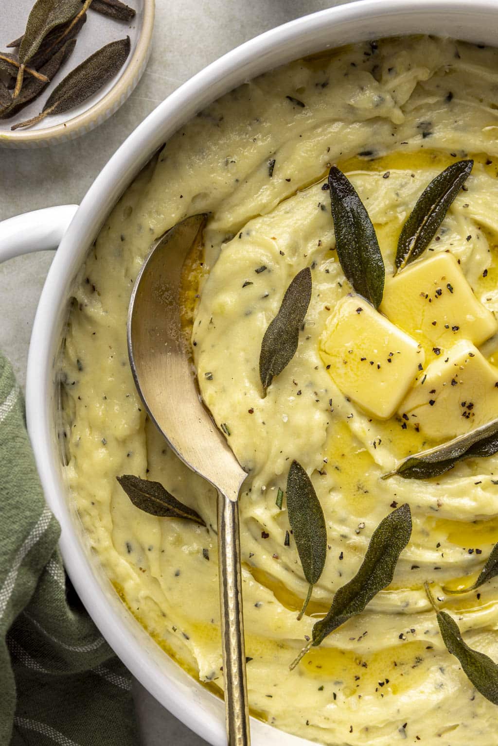 Mascarpone mashed potatoes topped with sage leaves and butter. 