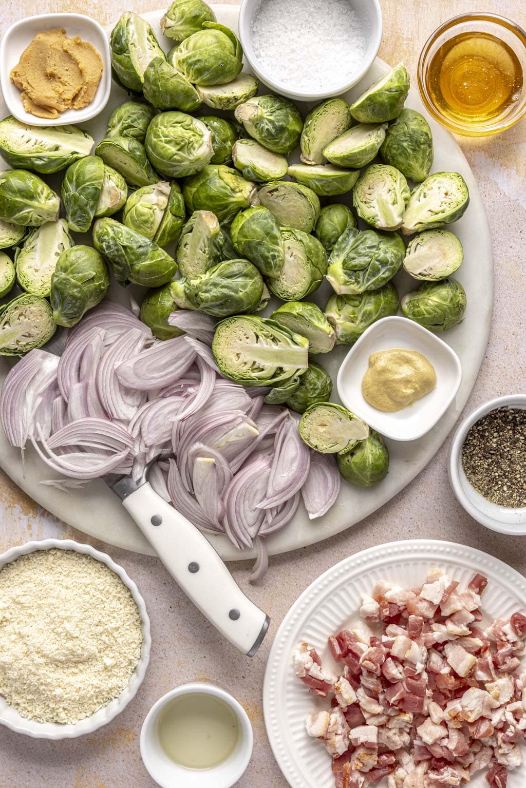 Ingredients for making sweet and savory Brussels sprouts with miso glaze. 