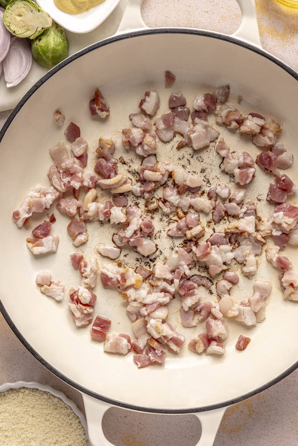 Chopped bacon in a Dutch oven. 