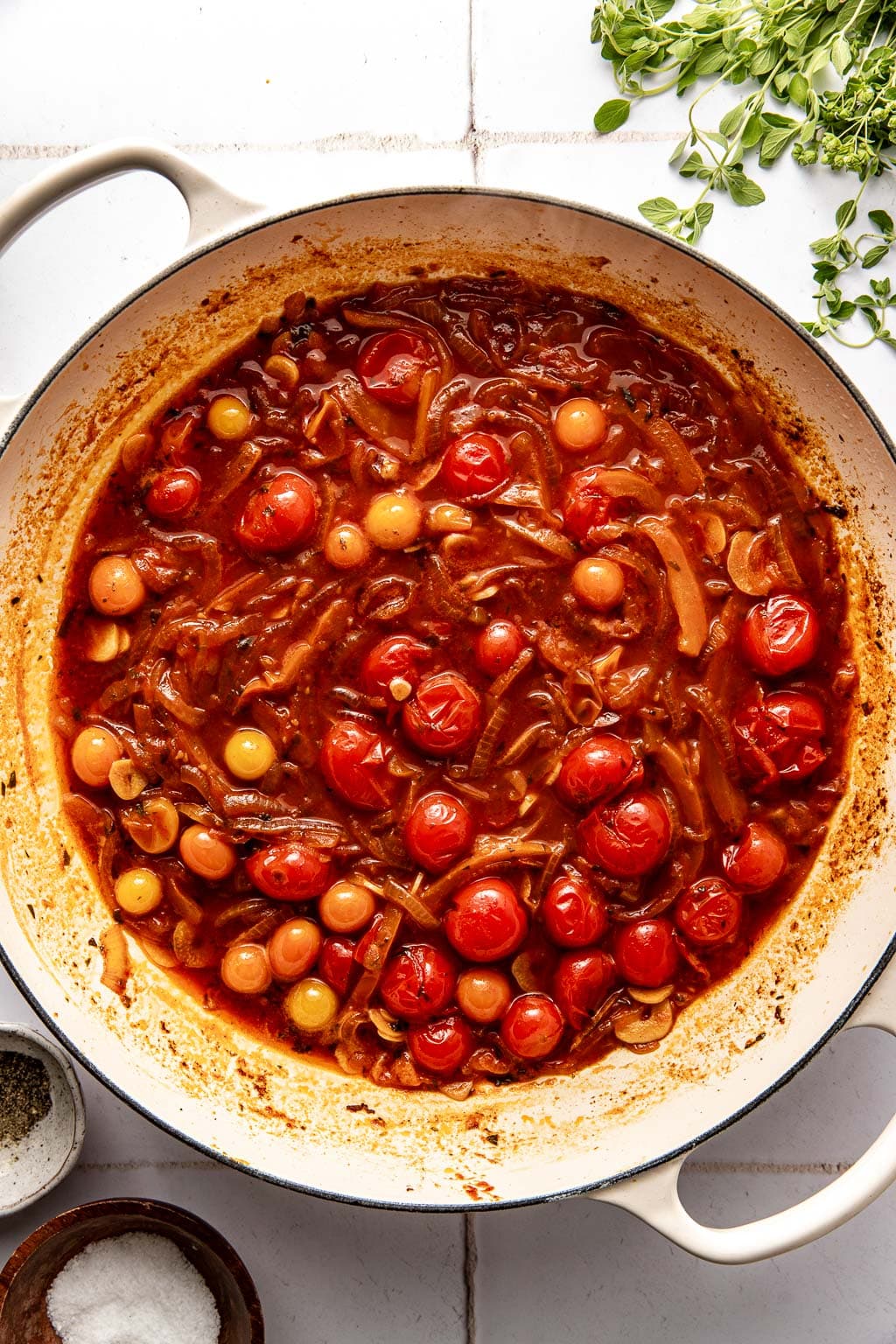 simmered tomatoes, peppers, and onions in a skillet