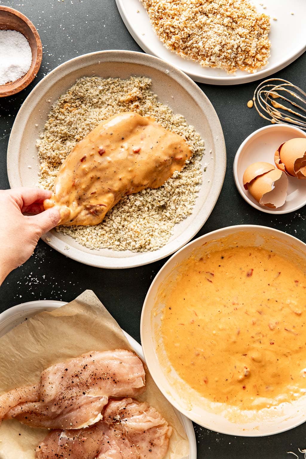 dredging chicken in breadcrumbs