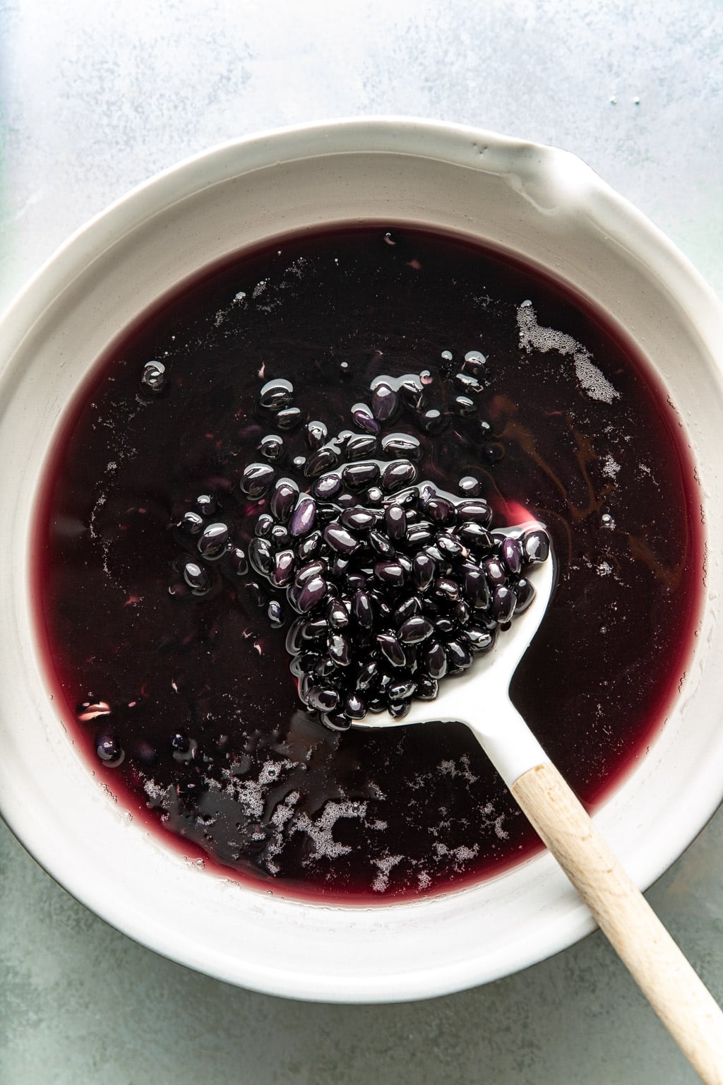 Black beans after soaking in a mixing bowl