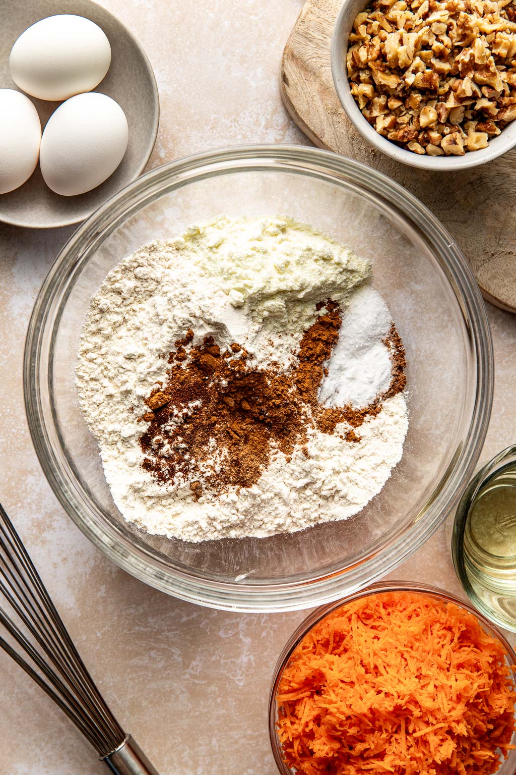 dry ingredients for carrot cake in a mixing bowl. 
