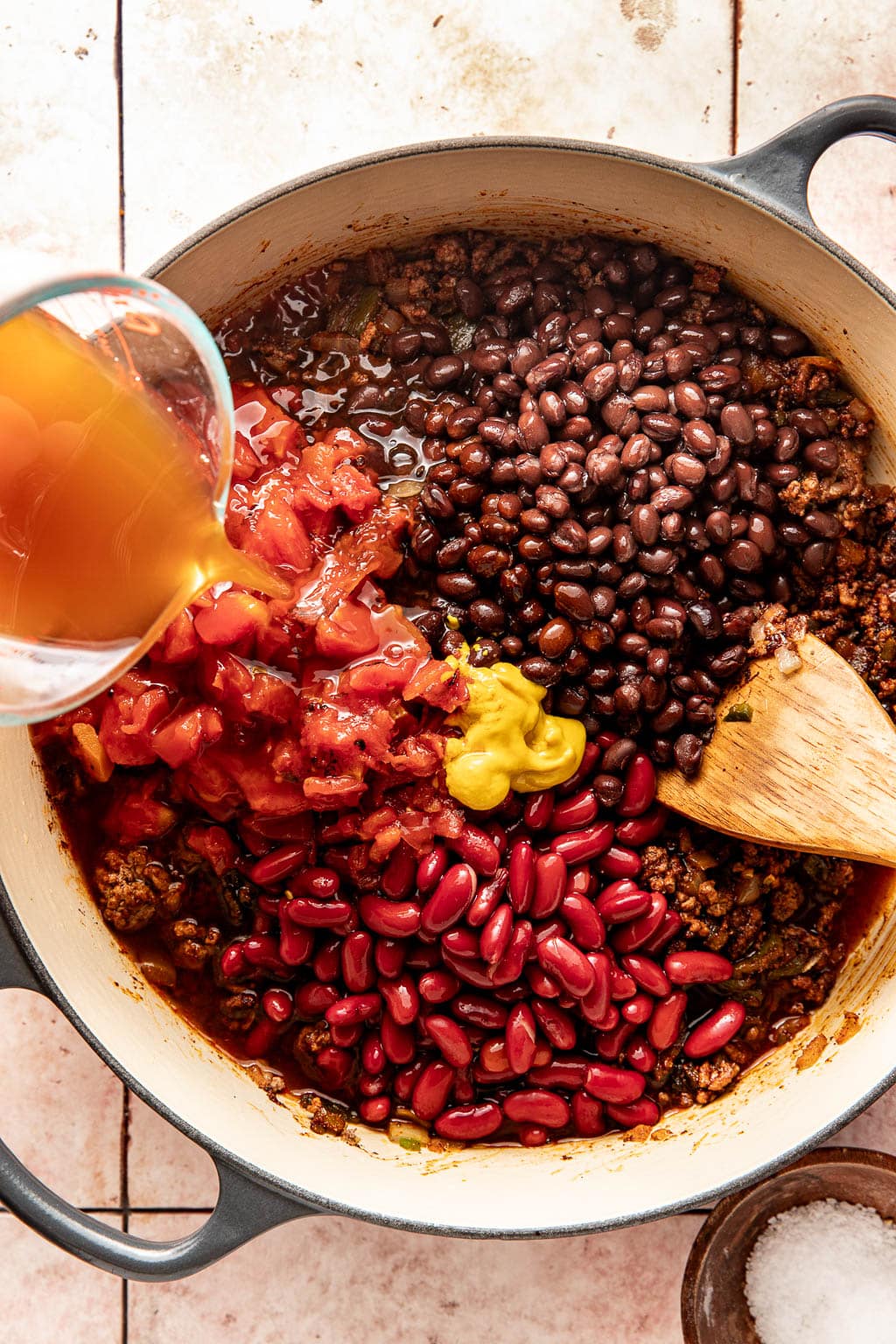 remaining chili ingredients being added