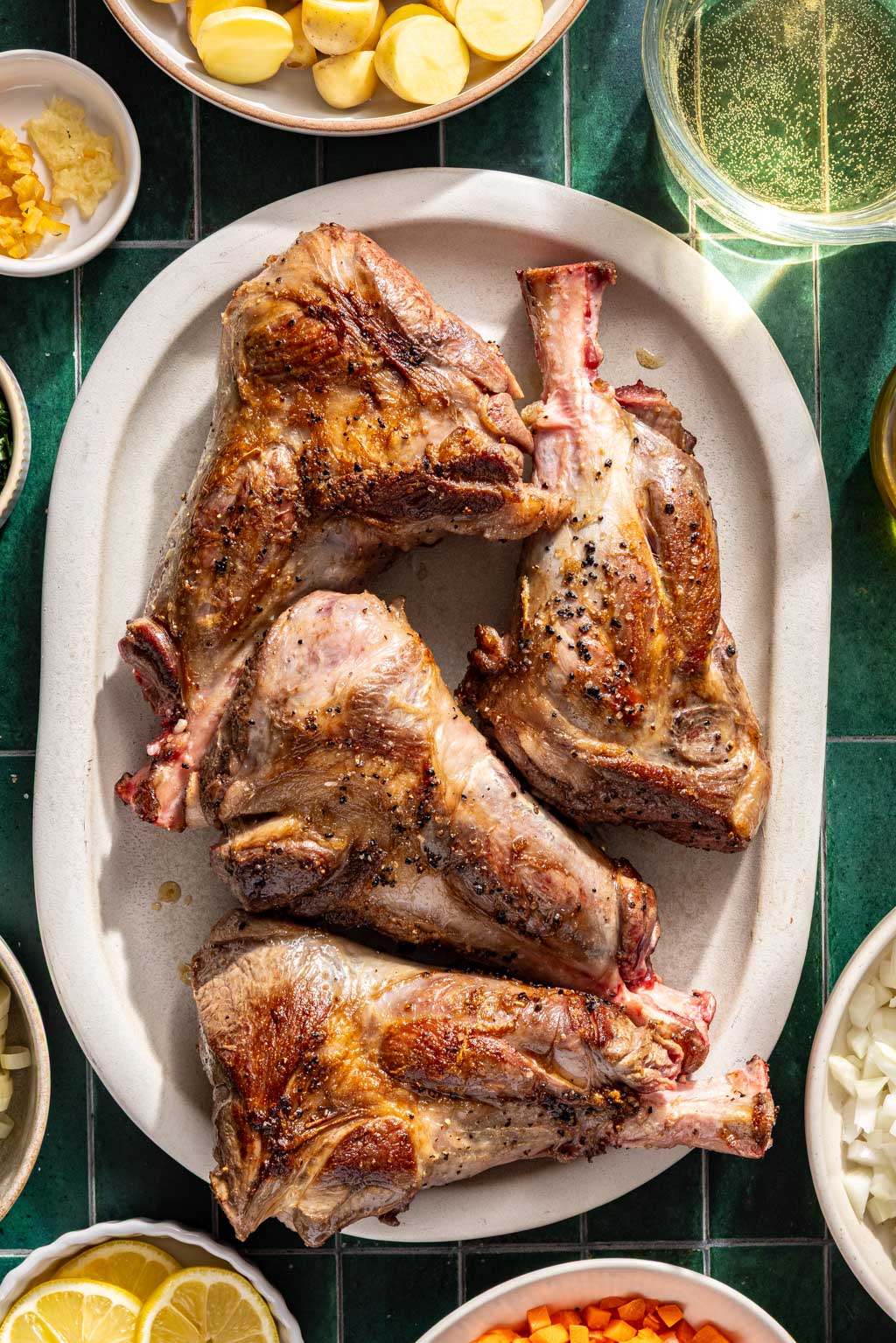 Lamb shanks on a plate, after searing