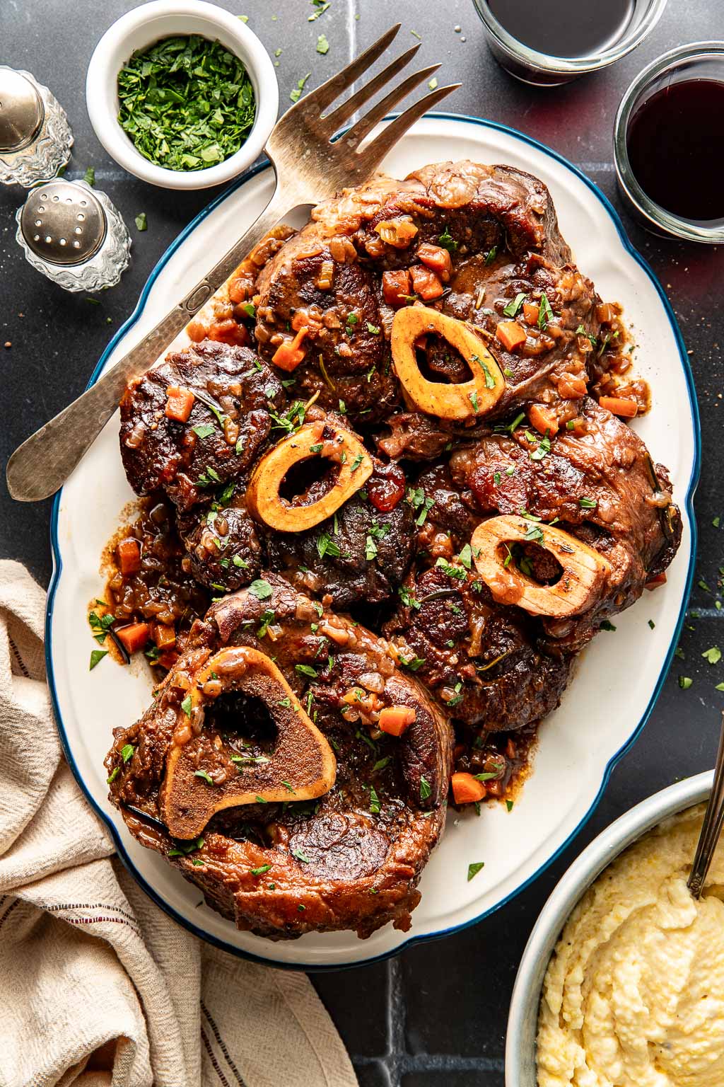red wine braised beef shanks on a serving platter